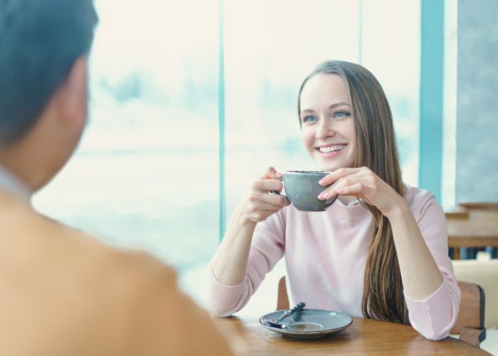 Woman Meet Man At Cafe