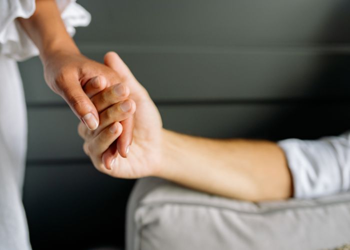 Couple Holding Hands Showing Emotional Connection