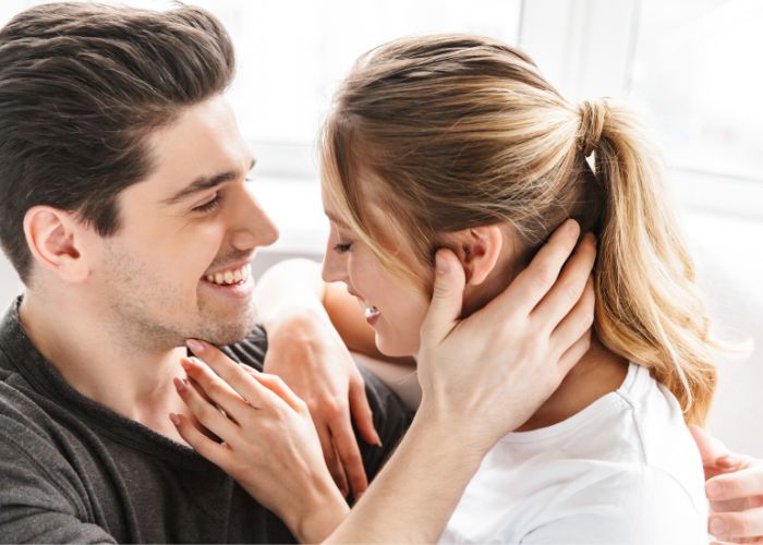 Optimistic Couple Hugging Each Other