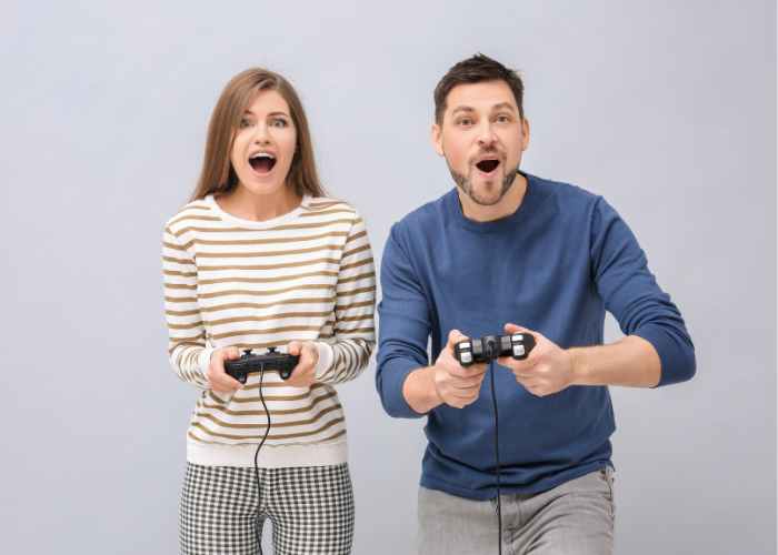 Happy Couple Playing Video Games Together
