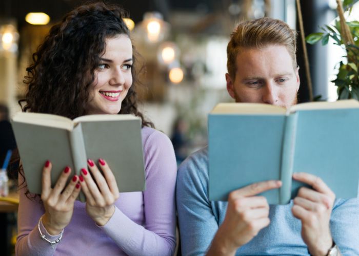 A Couple Reading A Book
