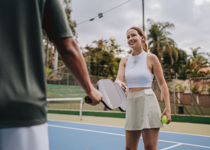 Couple Playing Tennis