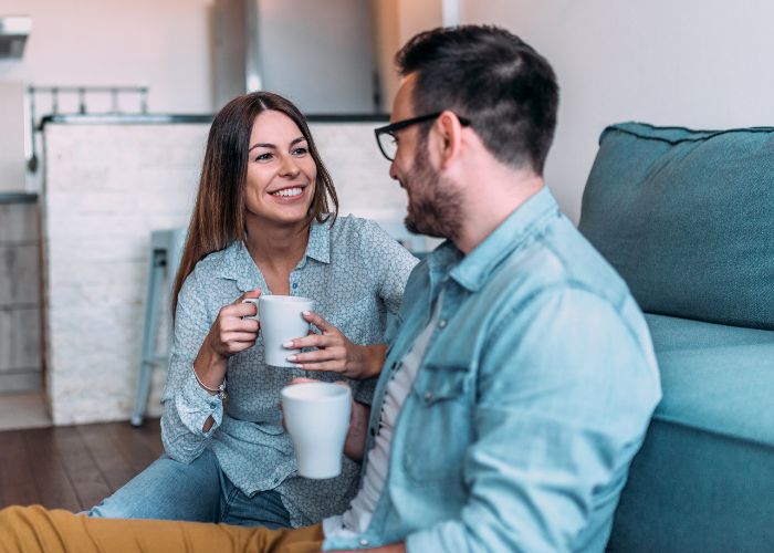 Couple Talking While Enjoy Coffe