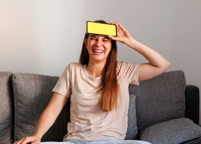 Happy Woman Plyaing Game Charades