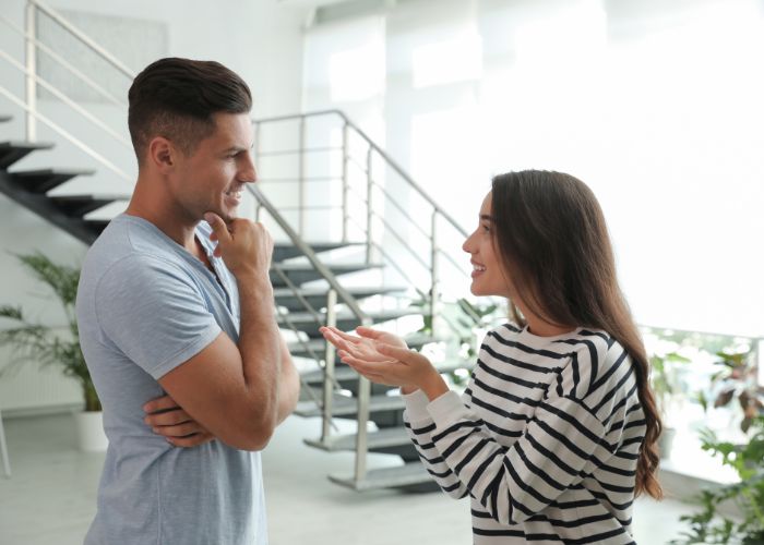 Woman Talking To Man
