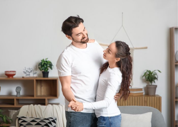 Couple Dancing At Home