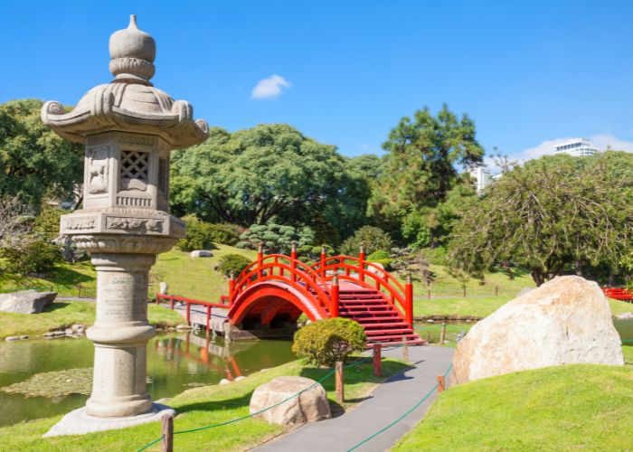 Japanese Garden With A Red Bridge