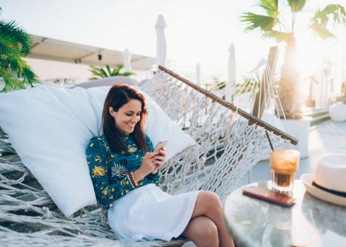 Outdoor Woman Using Phone And Checking Dating App