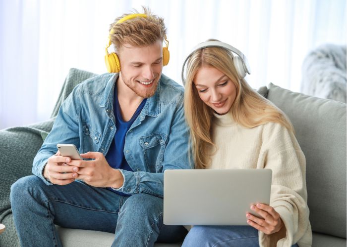 Smiling Couple Exploring Relationship Podcasts